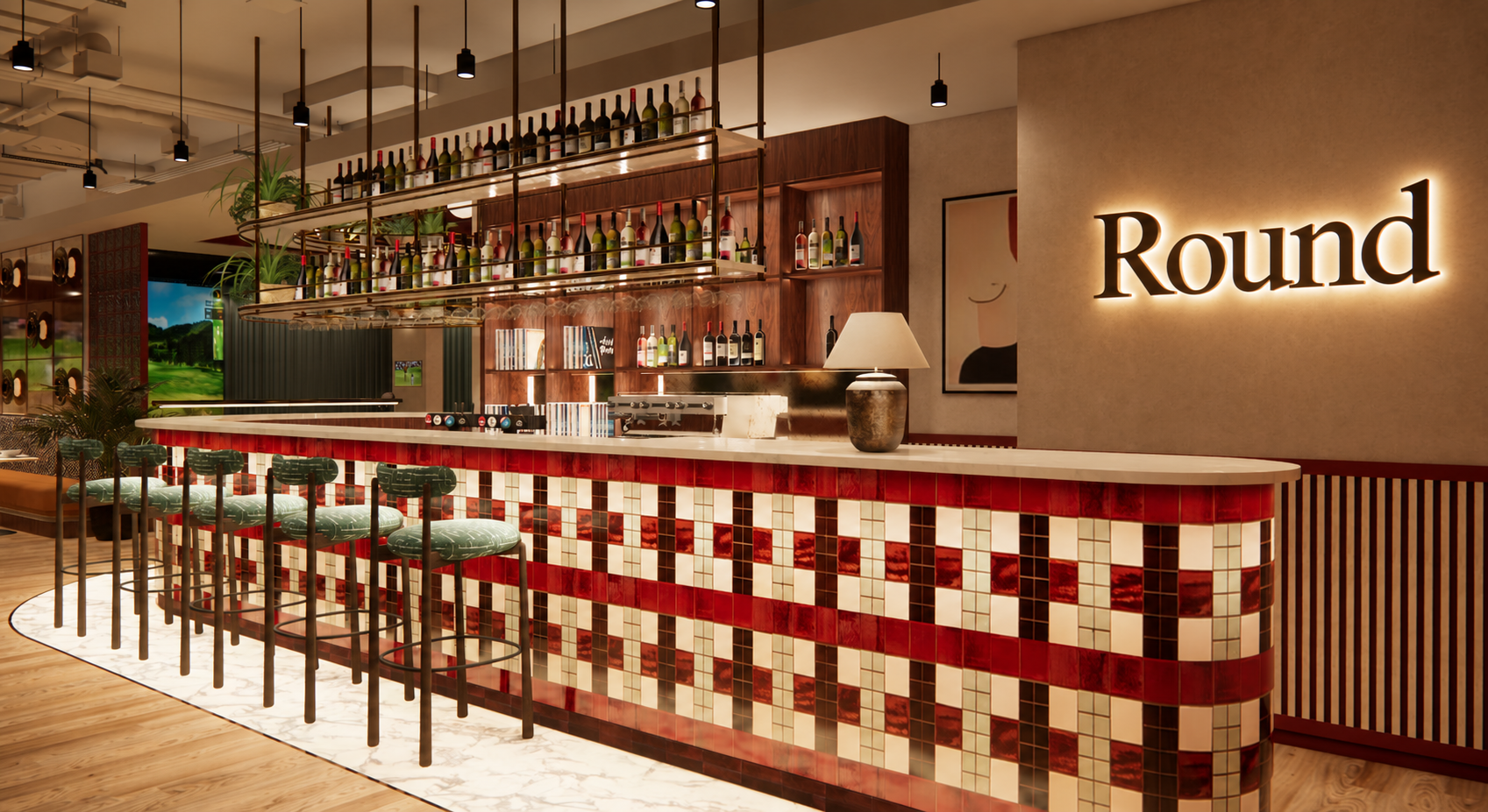 Round interior bar with tiled counter and backlit logo